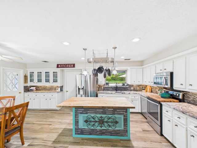 1310 Golden Bear Ln — FOREST COVE COUNTRY CLUB ESTATES SEC 4