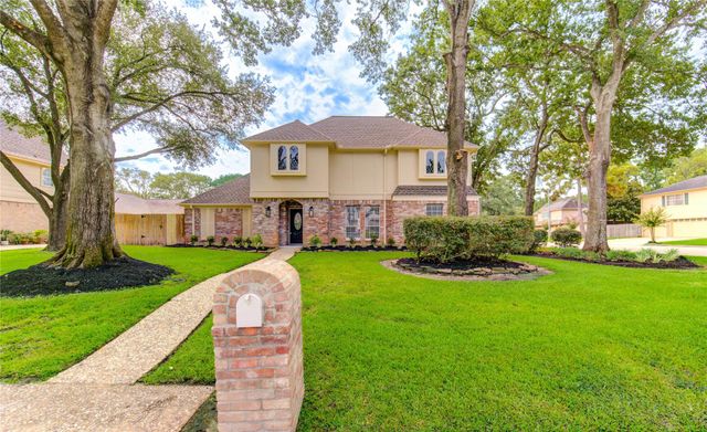 9115 Taidswood Dr — Champion Forest
