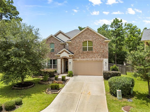 135 Teralyn Grove Loop — The Woodlands Hills