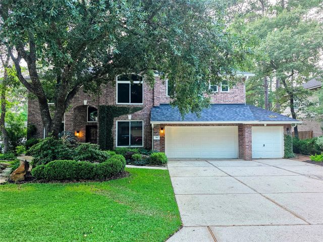 94 E Evangeline Oaks Cir — Wdlnds Village Alden Br 74