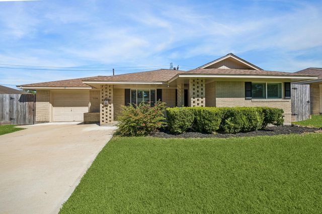 1214 W 31st St — Shepherd Forest