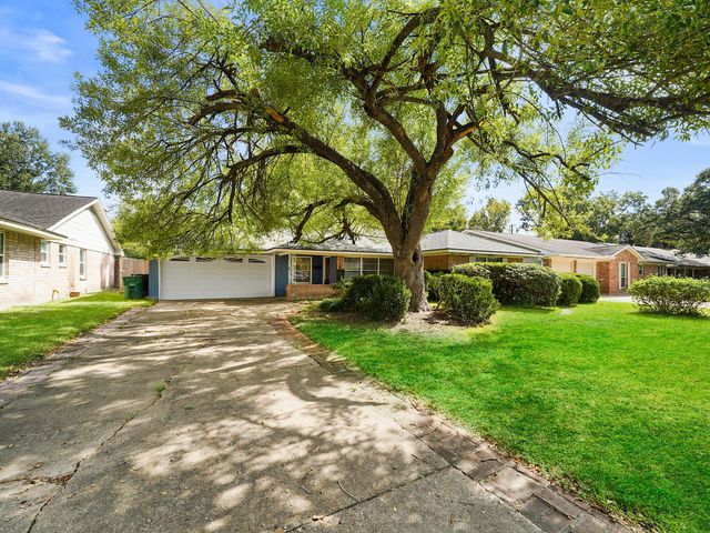 9015 Bintliff Dr — Braes Timbers